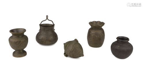 FIVE SMALL BRONZE CONTAINERS, INDIA FIRST HALF 20TH CENTURY decorated with engravings of vegetal