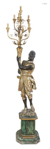 GREAT CANDELABRUM WITH SCULPTURE OF MOOR, LATE 19TH CENTURY in polychrome and gold lacquered wood.