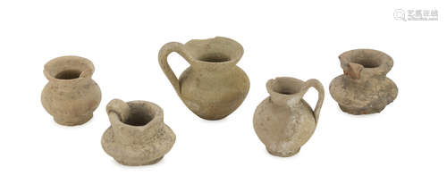 FIVE MINIATURE VASES, 5th-4th CENTURY B.C. in clay. Entire. Height 7-4 cm. The find is reported to