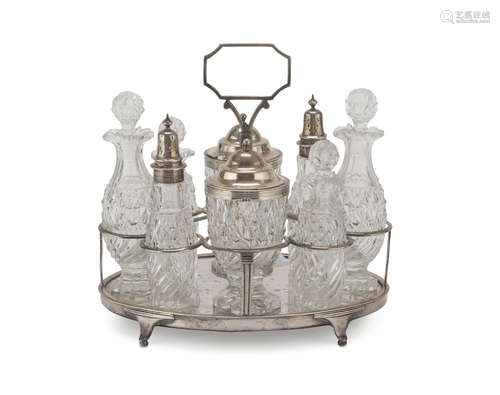 BIG SILVER-PLATED CRUET, PUNCH LONDON 1803 of oval shape with bottles in diamond points cut glass.