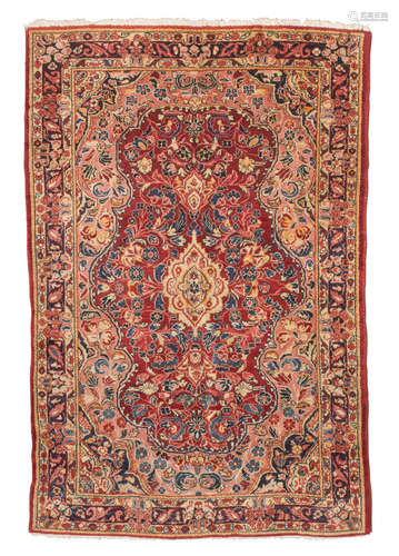 BAKTIARI CARPET, EARLY 20TH CENTURY with small medallion and secondary motifs of flower branches and