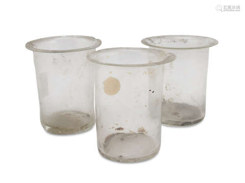 THREE SMALL VASES IN BLOWN GLASS, COLONIAL ART 19TH CENTURY with cylindrical bodies. Measures cm.