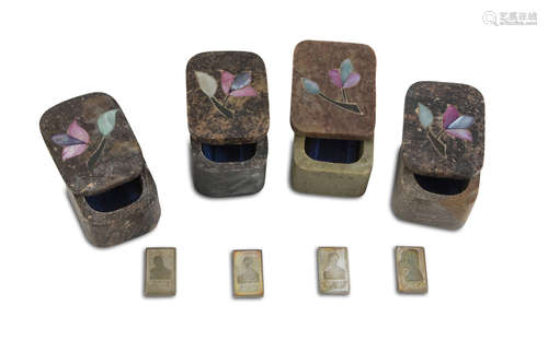 FOUR SMALL SILVER INGOTS decorated with portraits. In hard stone boxes. Marked. Measures cm. 2,5 x