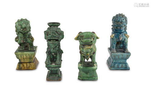 FOUR SCULPTURES IN GLAZED CERAMICS, CHINA 20TH CENTURY representing Buddhist lions in protective