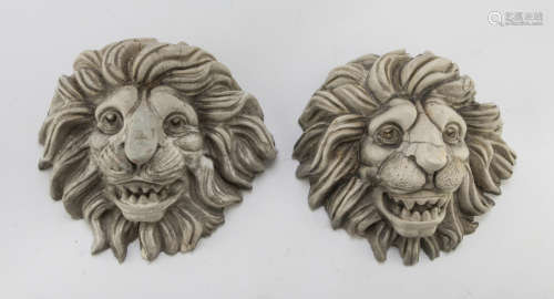 PAIR OF WALL FRIEZES IN PLASTER, EARLY 20TH CENTURY in white marbled enamel, representing lion