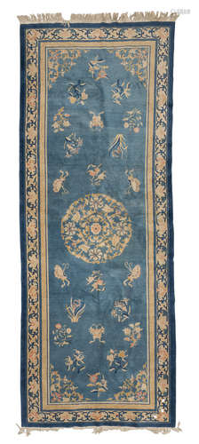 RARE CHINESE RUNNER, PEKING LATE 19TH CENTURY with big flower medallion and secondary motifs of