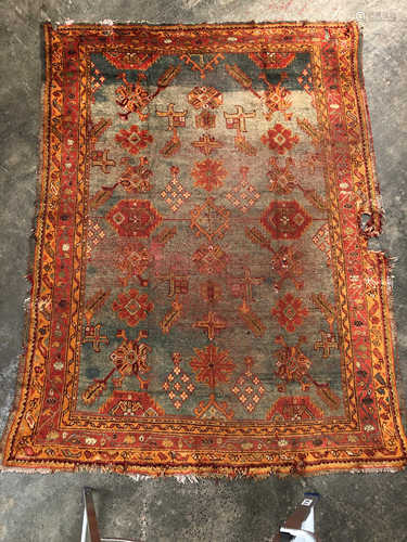 An Ushak Turkish carpet, the blue abrash field with an all over design of serrated leaves,