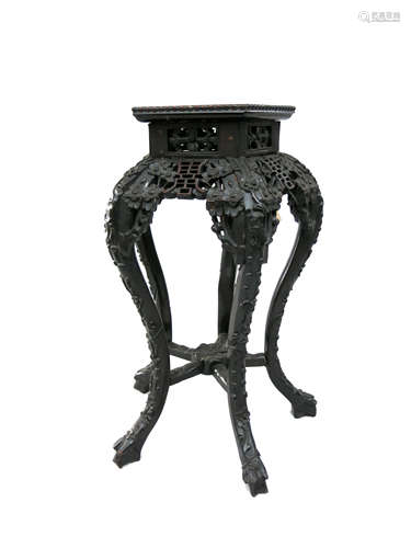 A Chinese carved hardwood jardiniere stand, 19th century,