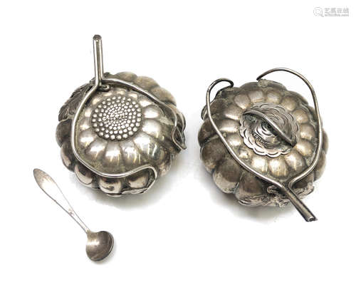 A pair of Chinese silver condiments,