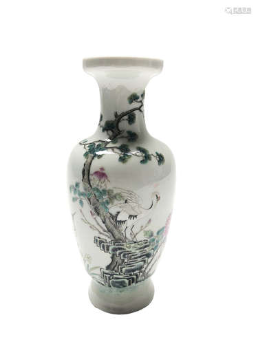 A Chinese famille rose porcelain vase, with a flowering tree and cranes, Qianlong red seal mark,