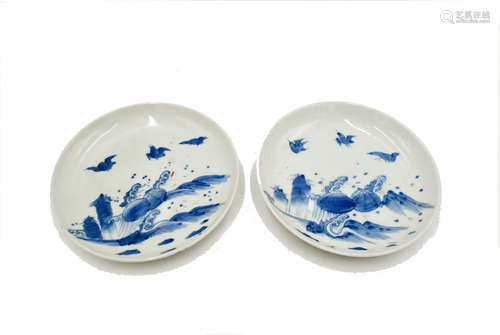 A pair of Chinese porcelain blue and white plates, circa 1680,