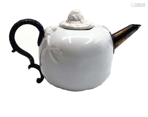 A Chinese blanc de chine teapot, Kangxi, of pomegranate shape,