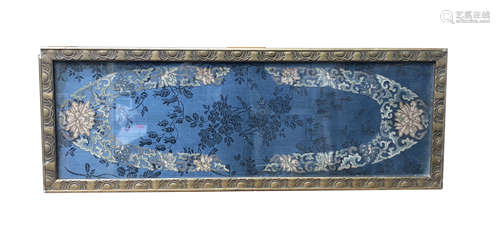 A Chinese silk embroidered panel, late 19th century, foliate decorated, framed and glazed,