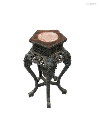 A Chinese carved hardwood jardiniere stand,