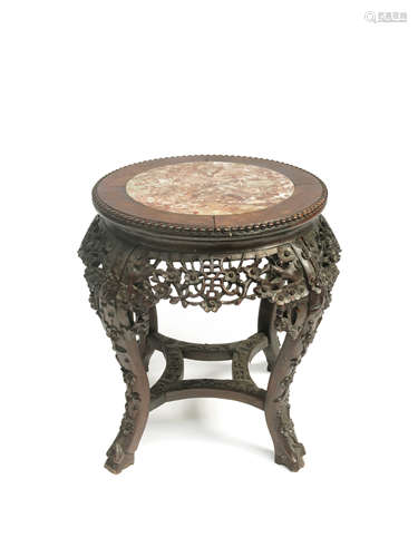 A Chinese carved hardwood jardiniere stand,