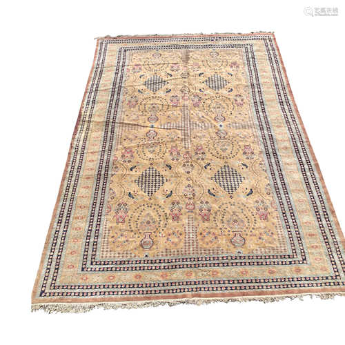 A Pakistan carpet, the yellow field with vases of flowers, birds, and medallions,