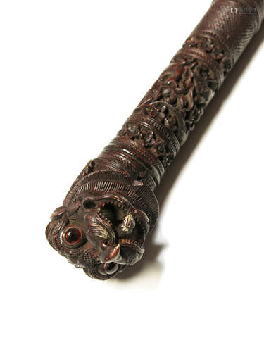 An Anglo-Indian Mysore carved walking cane, late 19th century,