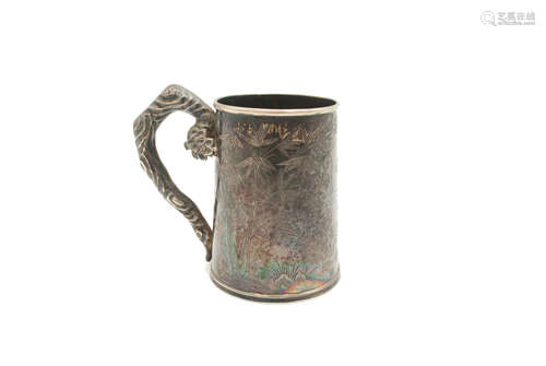 A Chinese silver mug, circa 1900, engraved with flowering trees, birds and bamboo,