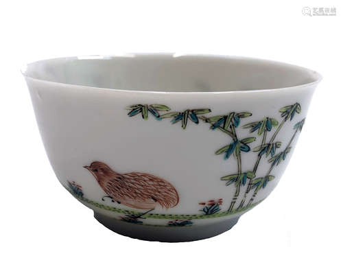 A Chinese porcelain tea bowl, 18th century, the body decorated with birds, bamboo and plants,