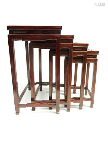 A nest of four Chinese hardwood occasional tables, mid 20th century,