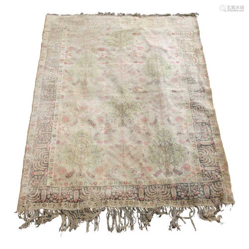 A Panderma silk rug, the olive green field with five trees and stylised flowering plants,