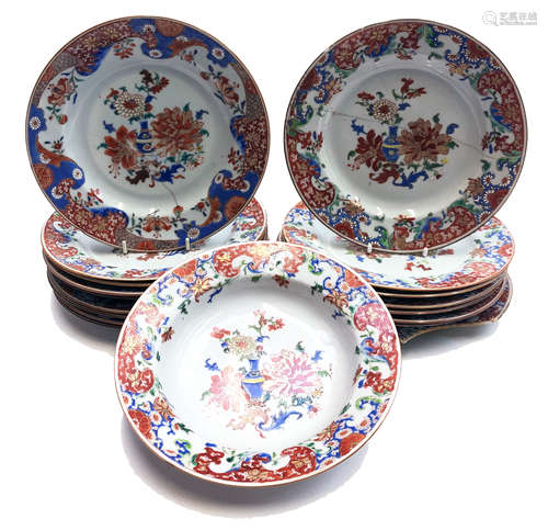 Seventeen similar Chinese porcelain plates, 18th century,