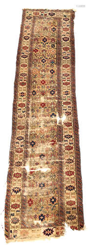 A Shirvan runner, East Caucusus, the yellow ground with an all over repeating design of guls,