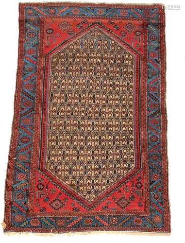 A Hamadan rug, North West Persia, with a large camel trellis medallion, madder gul spandrels,