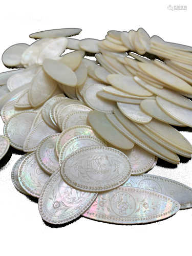 One hundred and six Chinese mother of pearl counters, of oval and circular form, lengths 5.