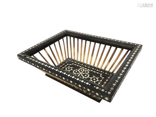 A Ceylonese ebony and porcupine quill basket, late 19th century, height 9cm, width 23cm, depth 18cm.