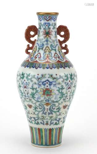 Chinese porcelain doucai vase with iron red handles, finely hand painted with flower heads amongst