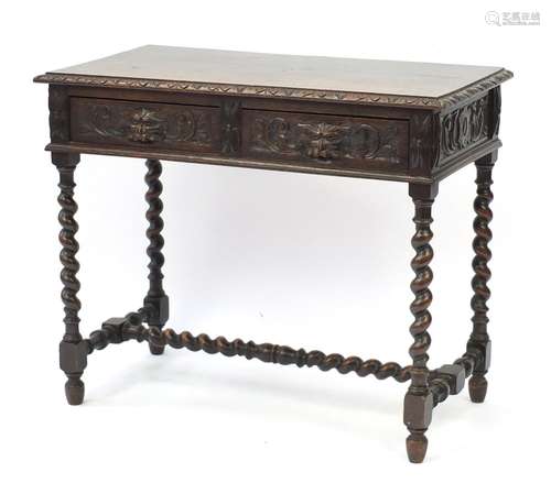 Oak hall table with lion mask carved drawers, barley twist supports and stretcher, 75cm H x 92cm W x