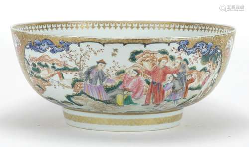 Chinese porcelain punch bowl, finely hand painted in the famille rose palette with panels of figures