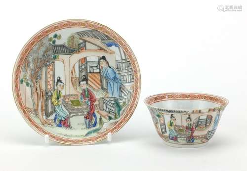 Chinese porcelain tea cup and saucer, finely hand painted in the famille rose palette with figures