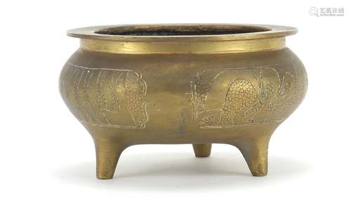 Chinese bronze tripod incense burner, character marks to the base, 8.5cm high x 14.5cm in diameter :