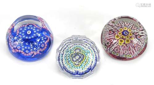 Four colourful faceted glass paperweights including an ER II Jubilee example, the largest 5.5cm high