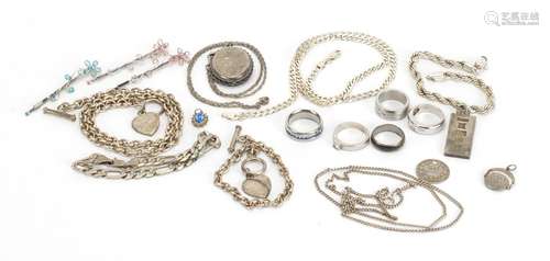 Silver and white metal jewellery including a Victorian style locket, rings and necklaces,