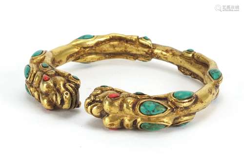 Tibetan gilt metal dragon bangle set with turquoise and coral, 8cm wide : For Further Condition