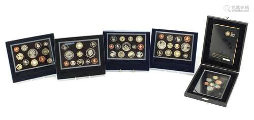 Four United Kingdom proof coin collections and a 2008 coinage Royal Shield of Arms proof