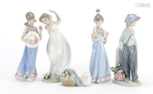 Four Lladro figures and a duck group, the largest 22cm high : For Further Condition Reports and Live