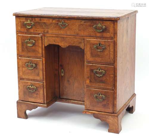 Antique walnut kneehole desk with quarter veneered top, cross banded and feather banded drawers