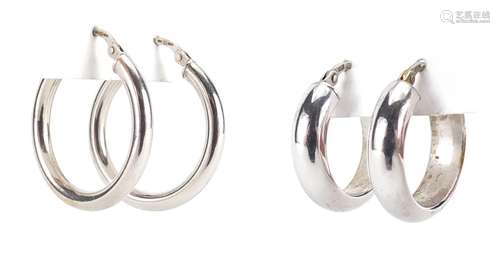 Two pairs of 9ct white gold hoop earrings, the largest 2.5cm in diameter, approximate weight 3.