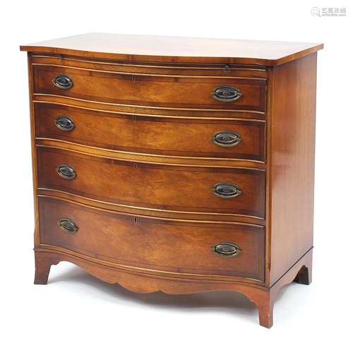 Good quality reproduction mahogany serpentine chest with yew wood banding and brushing slide above