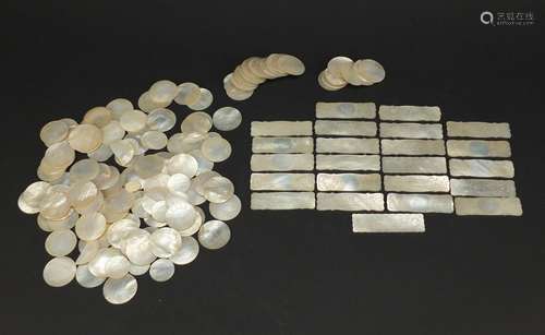 Collection of Chinese Canton mother of pearl gaming tokens, decorated with butterflies and