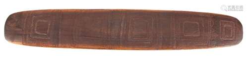 Aboriginal parrying shield carved with tribal motifs, 77cm in length : For Further Condition Reports