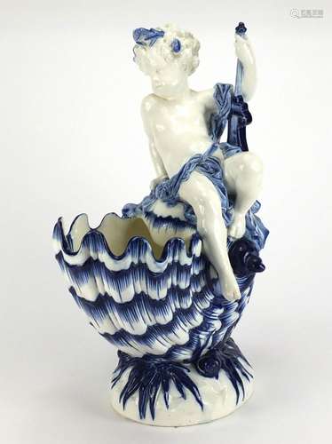 Large Victorian nautilus shell centre piece by Minton mounted with a semi nude young boy,