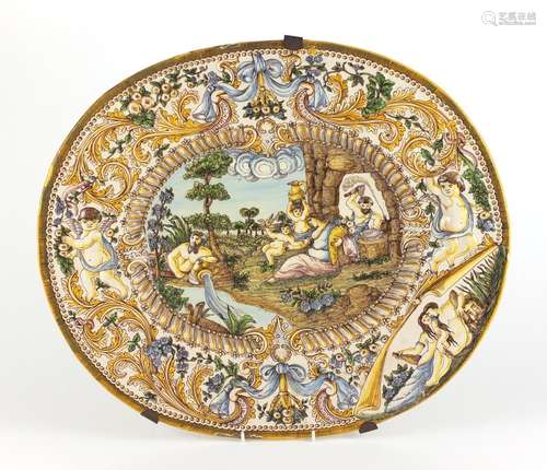 Antique Italian Majolica charger decorated in relief and hand painted with classical figures,