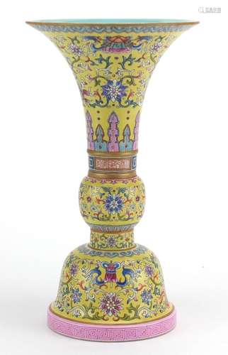 Chinese porcelain two section Gu vase, hand painted in the famille rose palette with daoist