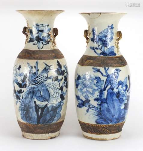 Pair of Chinese blue and white crackle glazed baluster vases with twin handles, hand painted with