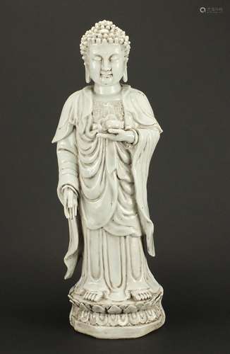 Large Chinese Blanc de Chine figure of standing Buddha, impressed character marks to the base,